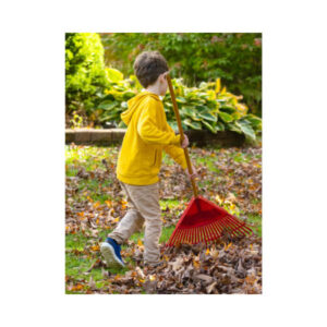 Child raking up leaves