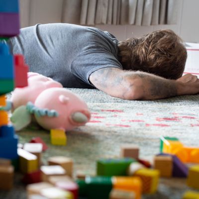 parent napping on the floor