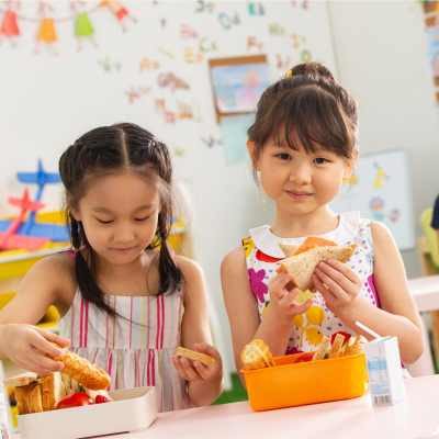 Young children eating lunch